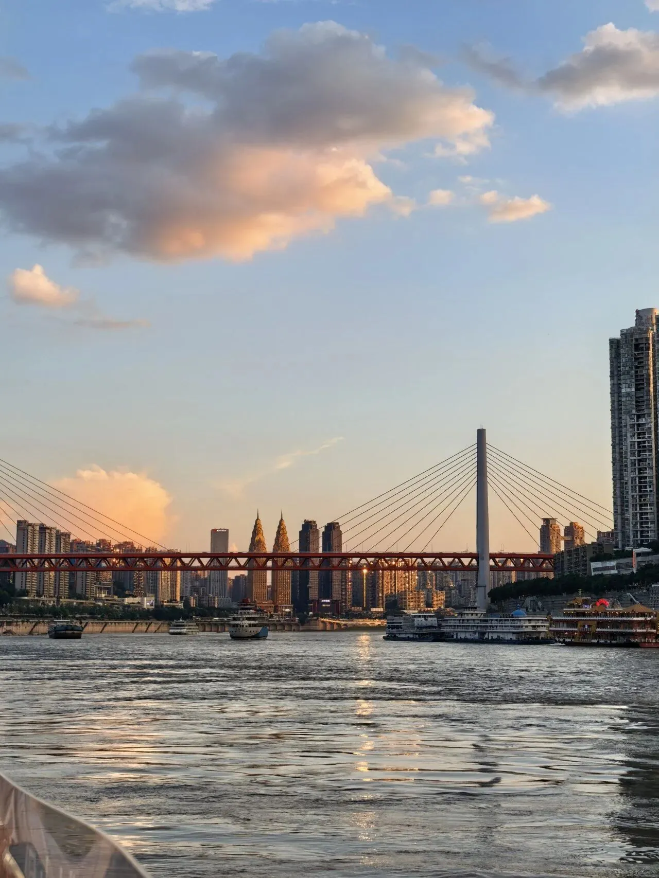View of Chongqing's bridges and skyline from the two-rivers ferry at dusk