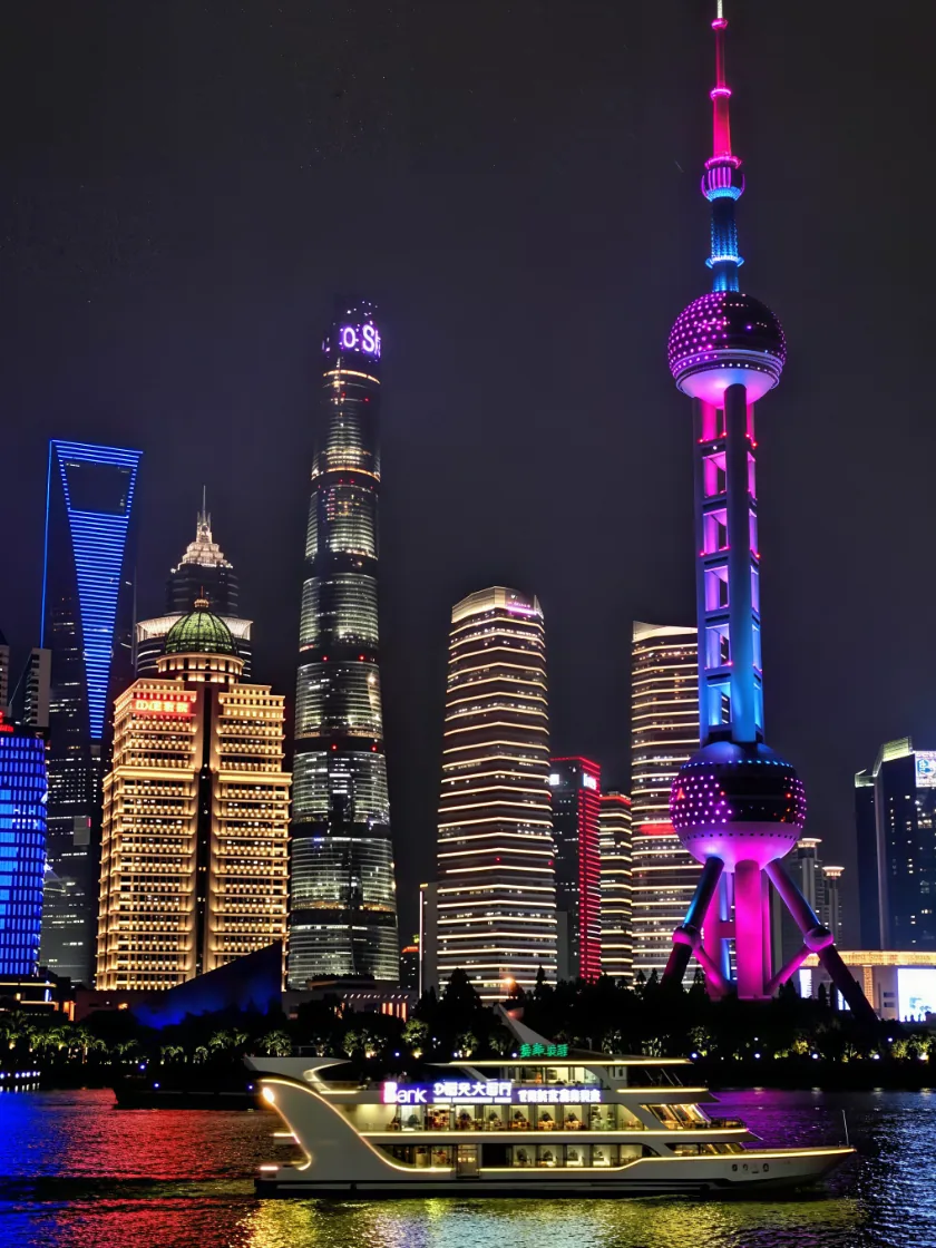 The Bund and Pudong skyline lit up at night, Shanghai